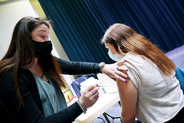 Students give vaccine a shot
